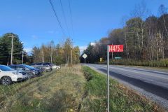 20251015_161944-parking-road-number-sign-scaled